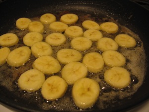Caramelize bananas in butter and sugar